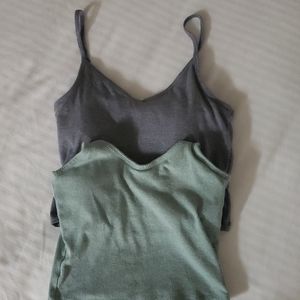 2 cropped tops with built in bra